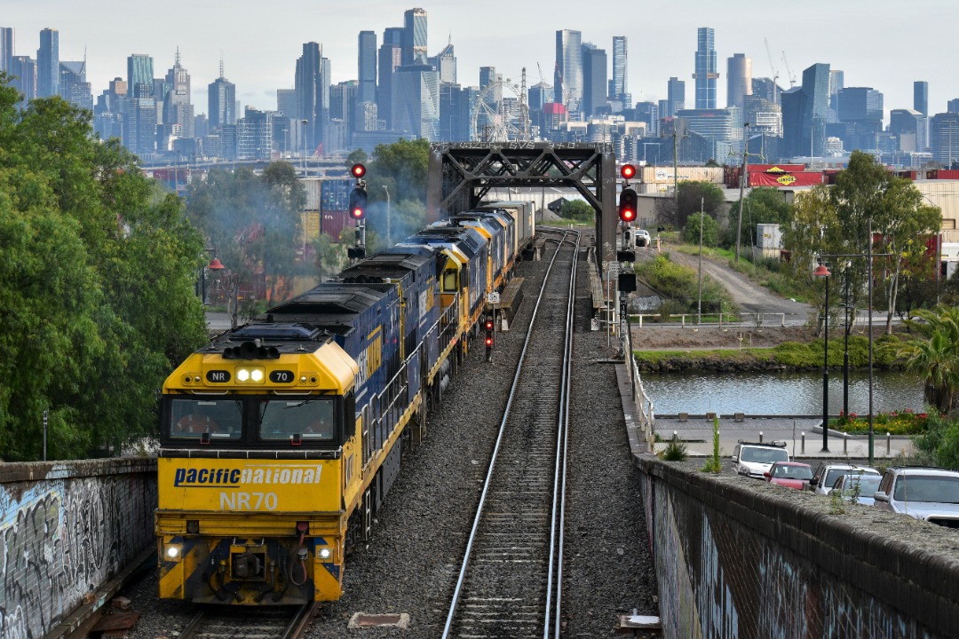 Shawn Stutsel on Train Siding: Pacific National's NR70, NR35, 8180, 8170, and 8119 pull out of Dynon, Melbourne on a diverted 6PS7, Intermodal Service,
bound for...