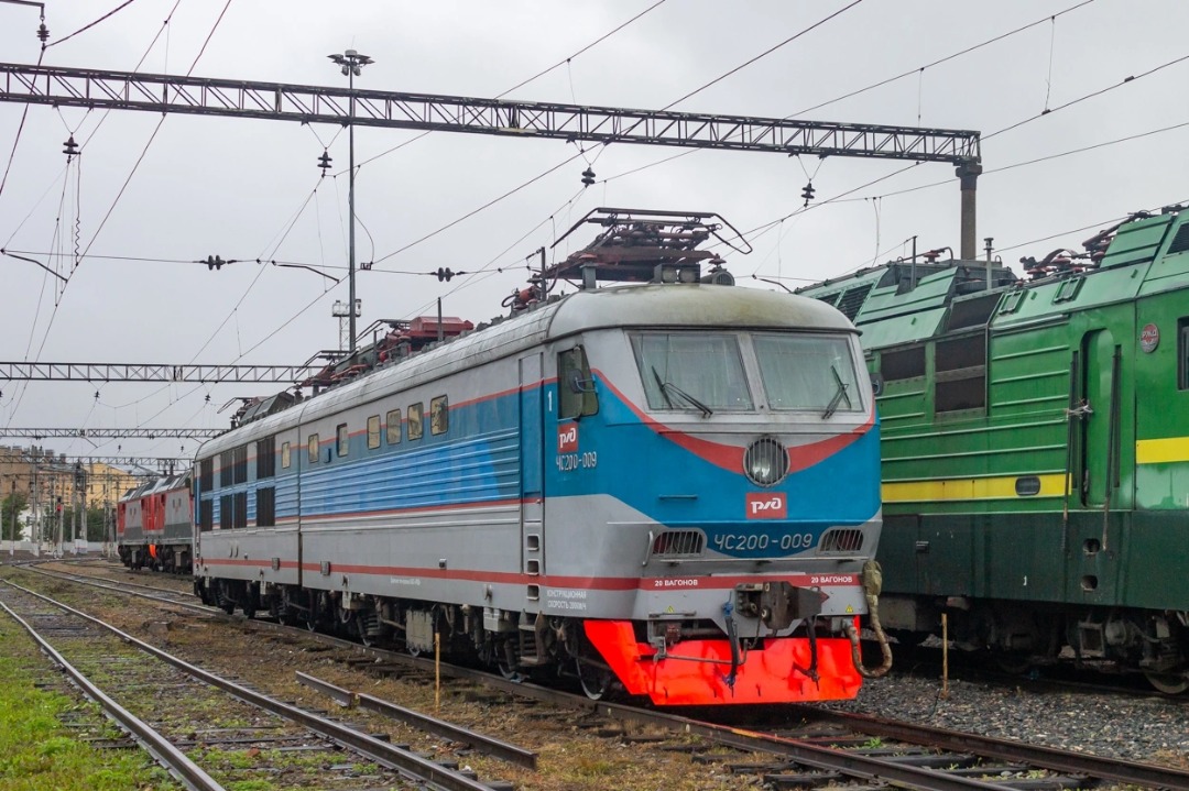 Vladislav on Train Siding: high-speed electric locomotive CHS200-009 in the livery of the Nevsky Express train in the Komsomolsk park of the St....