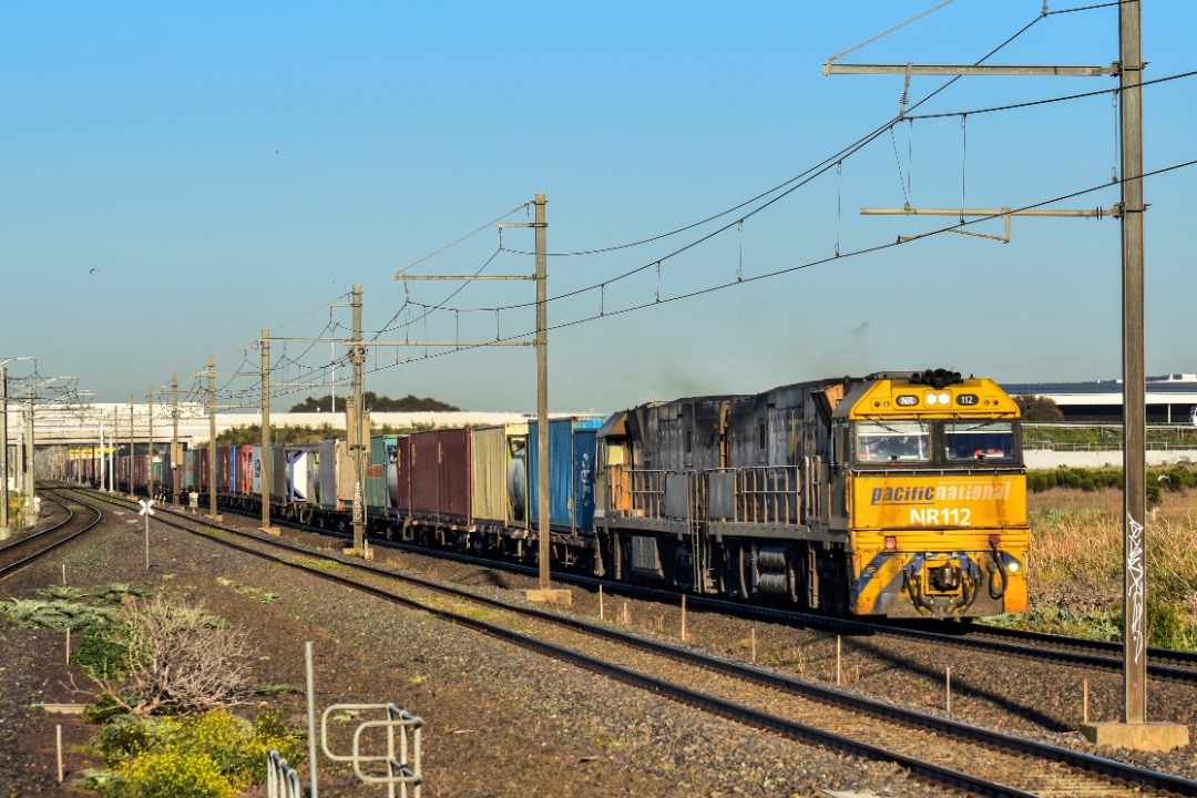 Shawn Stutsel on Train Siding: Pacific National's NR112 and NR86 thunders through Williams Landing, Melbourne with 3AM5, Intermodal Service ex Adelaide...