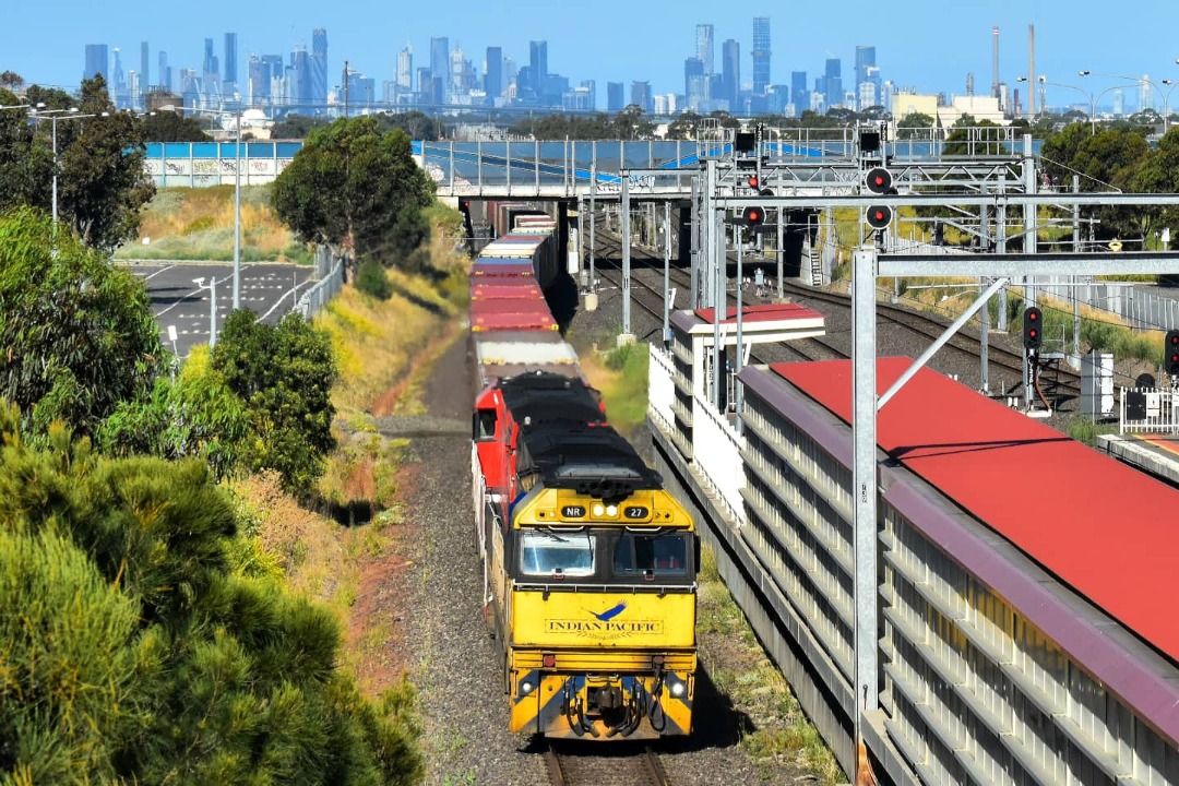 Shawn Stutsel on Train Siding: My first photo of 2022 and it's of Pacific National's NR27 (IP) and NR18 (Ghan) power through Laverton, Melbourne with
a rather short...