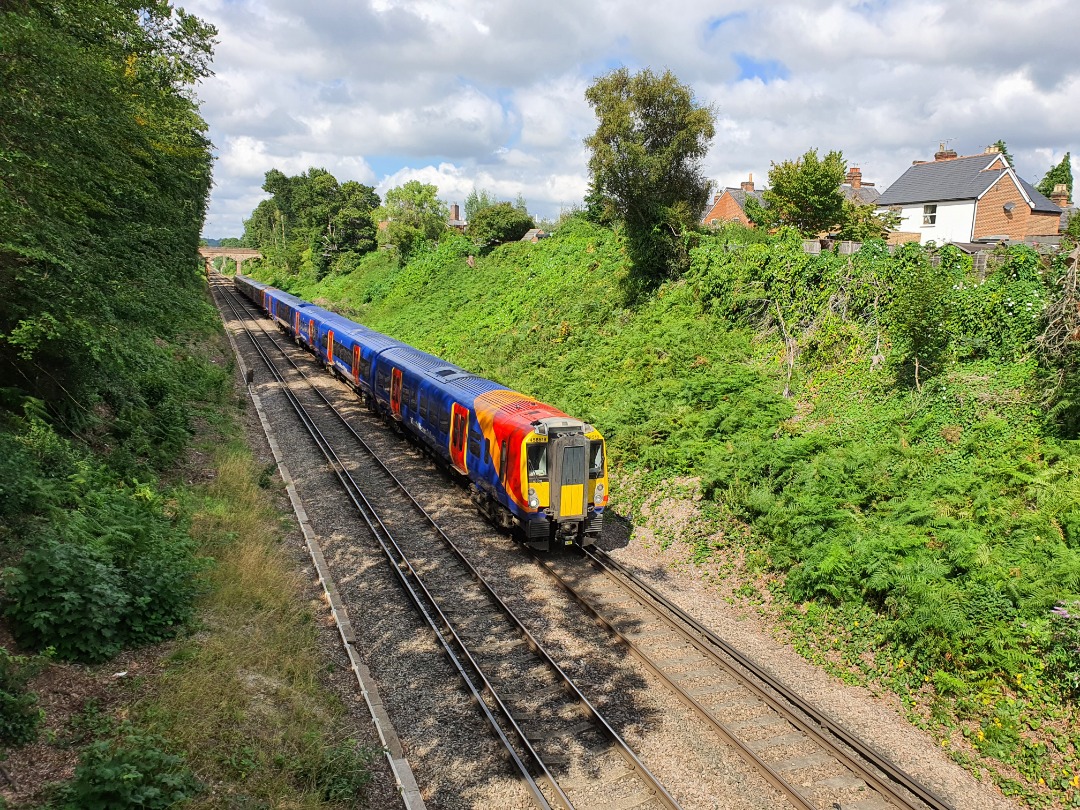 simes2762 on Train Siding: 458518 + a friend head into London. Photo from bridge over at Sunninghill, Sunningdale behind me, and Ascot in the distance.