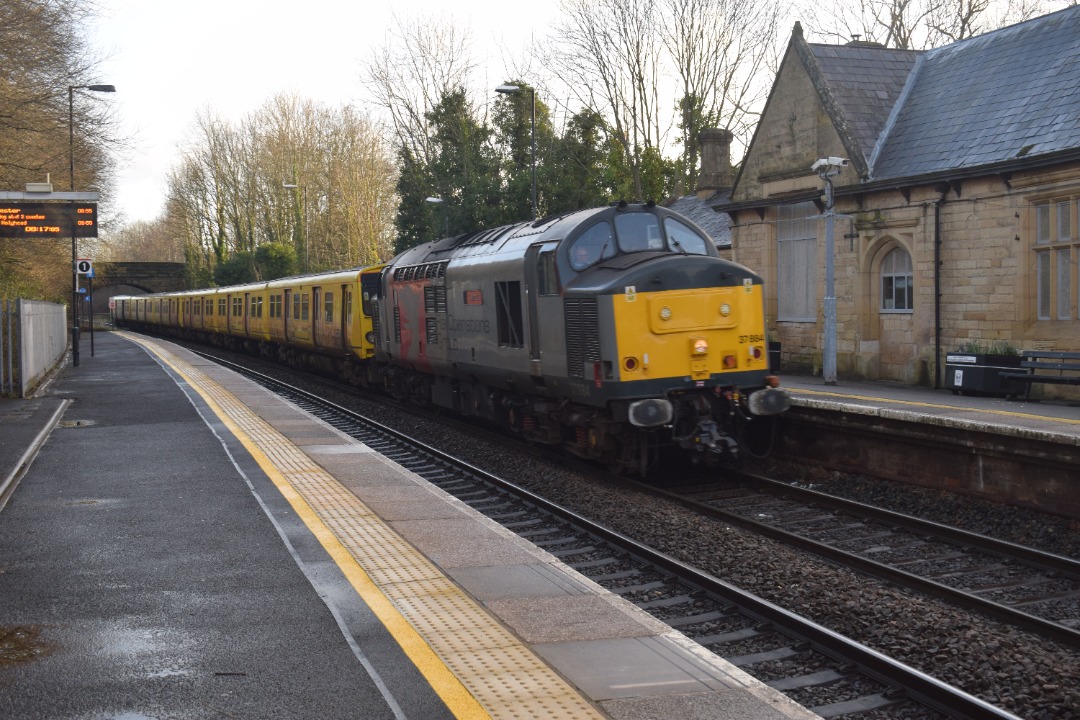 Hardley Distant on Train Siding: CURRENT: 37884 'Cepheus' passes through Ruabon Station today hauling Merseyrail Units 507032 (Front) and 507013
(Rear) for scrap as...