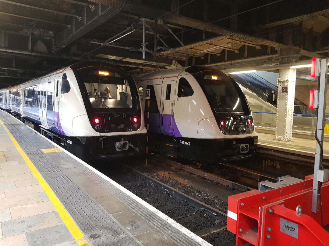 Jack Jack Productions on Train Siding: 345 028 in from Heathrow Central, for Terminals 2 and 3, and 345 043 ready to go to Reading on Platforms 11 and 12 at
London...