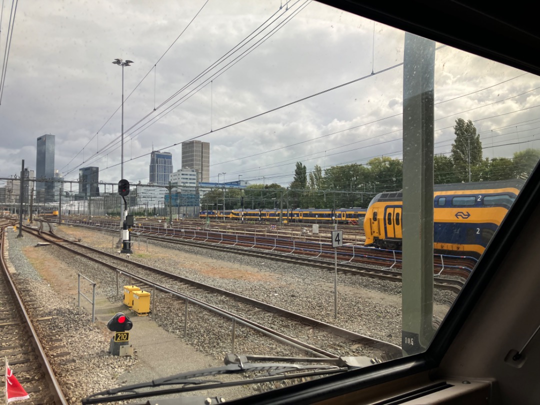 Roeland Kluit on Train Siding: View from a VIRMm1 on depot Rotterdam CS. In the distance the skyline of Rotterdam and some other trains; VIRMm23, ICng, Traxx
and ICMm.