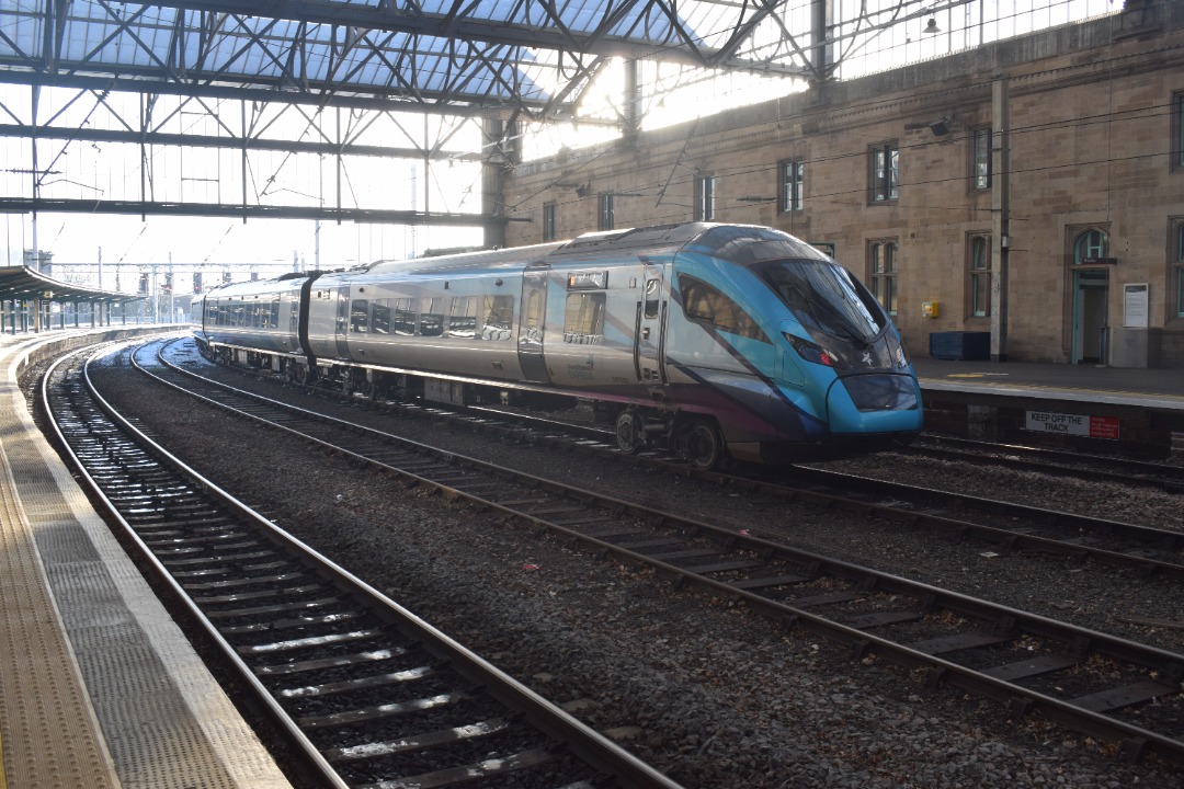 Hardley Distant on Train Siding: CURRENT: 379002 (Both Photos) stands in one of the middle through roads at Carlisle Station yesterday between duties