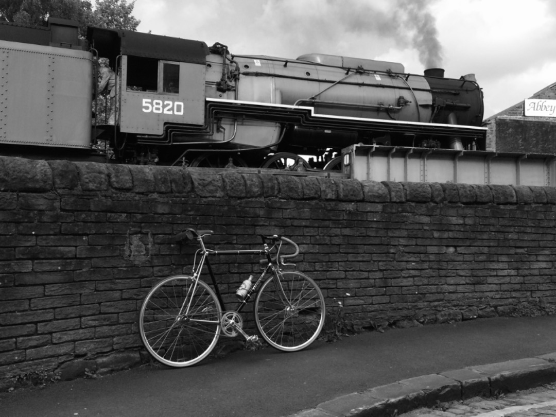 k unsworth on Train Siding: 5820 USA Transportation Corp. Class S160 2 prepares to depart Keighley 16-5-2015 ft.my vintage Pinarello bike🙂