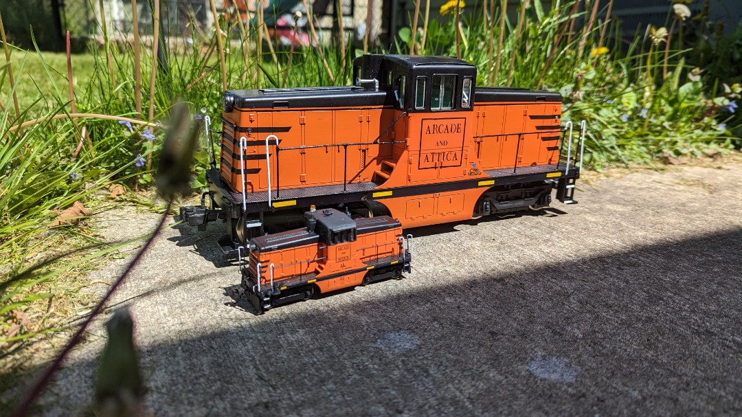 CaptnRetro on Train Siding: Arcade & Attica "G" Scale Diesel for the Arcade Train Station loop, and my personal HO Scale one. Both custom painted
by the same local...
