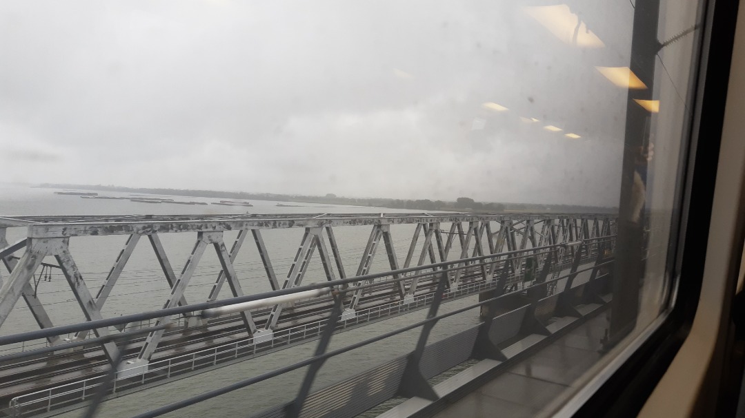 Arthur de Vries on Train Siding: Looking down on the main line railway bridge over the Hollands Diep river from the high speed line bridge, while going south.