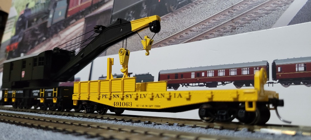 M. on Train Siding: Added this 200-ton crane and boom car to my collection yesterday. Plans to detail the boom car are in the works, so it's going to look
a lot...