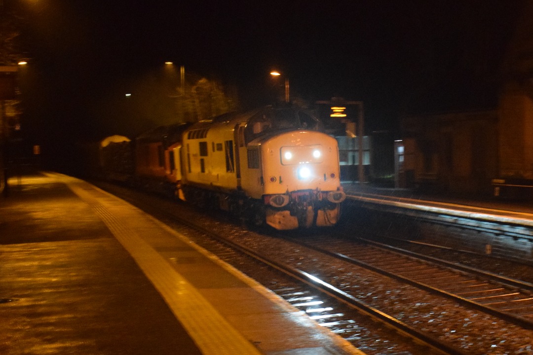 Hardley Distant on Train Siding: CURRENT: 97303 'Dave Berry' (Leading) and 37405 in Harry Needle Orange Livery (Behind) speed through Ruabon Station
today with the...