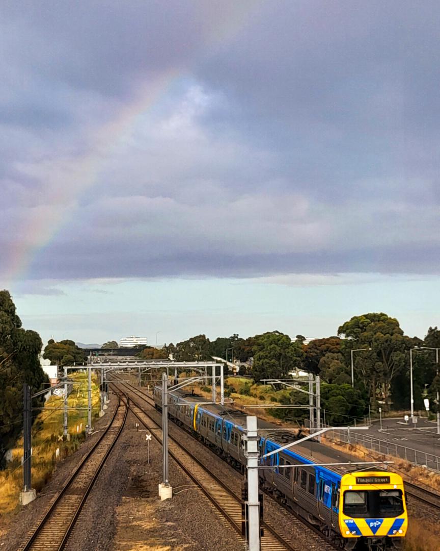 Shawn Stutsel on Train Siding: A Melbourne Metro Trains Comeng Set approaches Laverton Station, Melbourne and passes underneath a partial rainbow 🌈 heading
for...