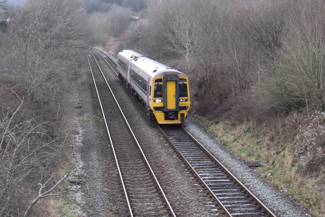 Hardley Distant on Train Siding: CURRENT: 158819 passes Rhosymedre near Ruabon roday with the 1W93 Cardiff Central to Holyhead (Transport for Wales) service.