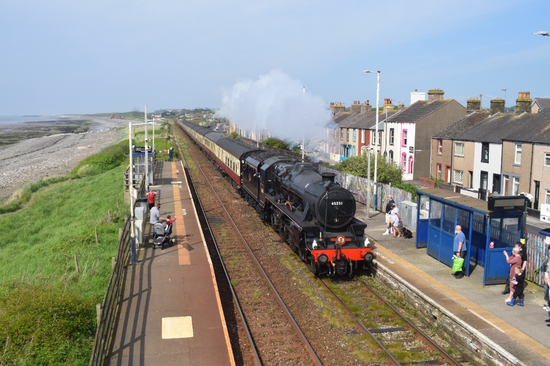 Hardley Distant on Train Siding: CURRENT: 45231 'Sherwood Forester, (Front - 1st Photo) and 47614 (Rear - 2nd Photo) speed through Flimby Station between
Maryport and...
