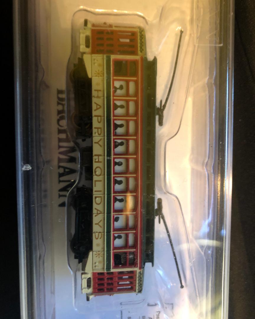 KiwirailSpotter on Train Siding: I went to my hobby shop and got a brand new N scale Bachmann lighted Brill Trolley in the Christmas livery.