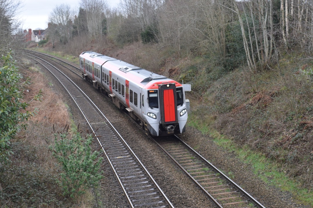 Hardley Distant on Train Siding: CURRENT: 197013 approaches Ruabon Station today with the 1V97 12:37 Holyhead to Cardiff Central (Transport for Wales) service.