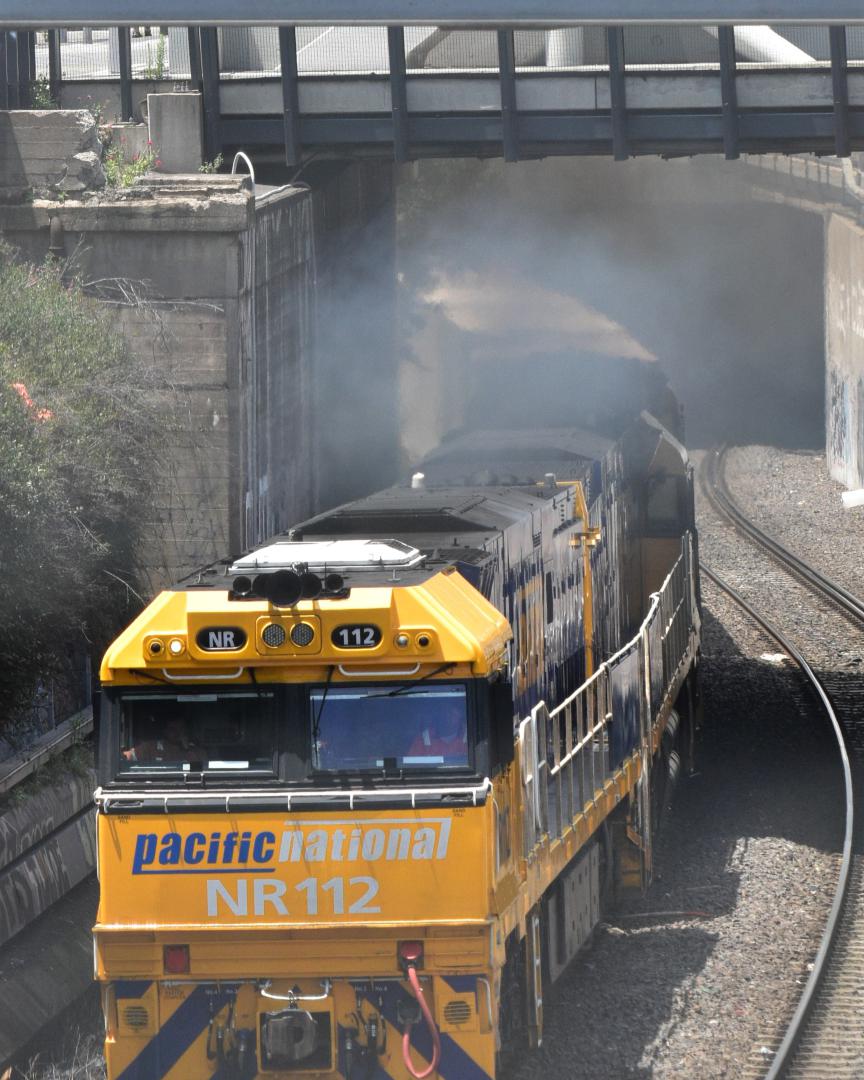 Shawn Stutsel on Train Siding: Pacific National's NR112, NR37 and NR61 smoke it out of the Bunbury Street Tunnel, Footscray Melbourne with 6MP4, Intermodal
Service...