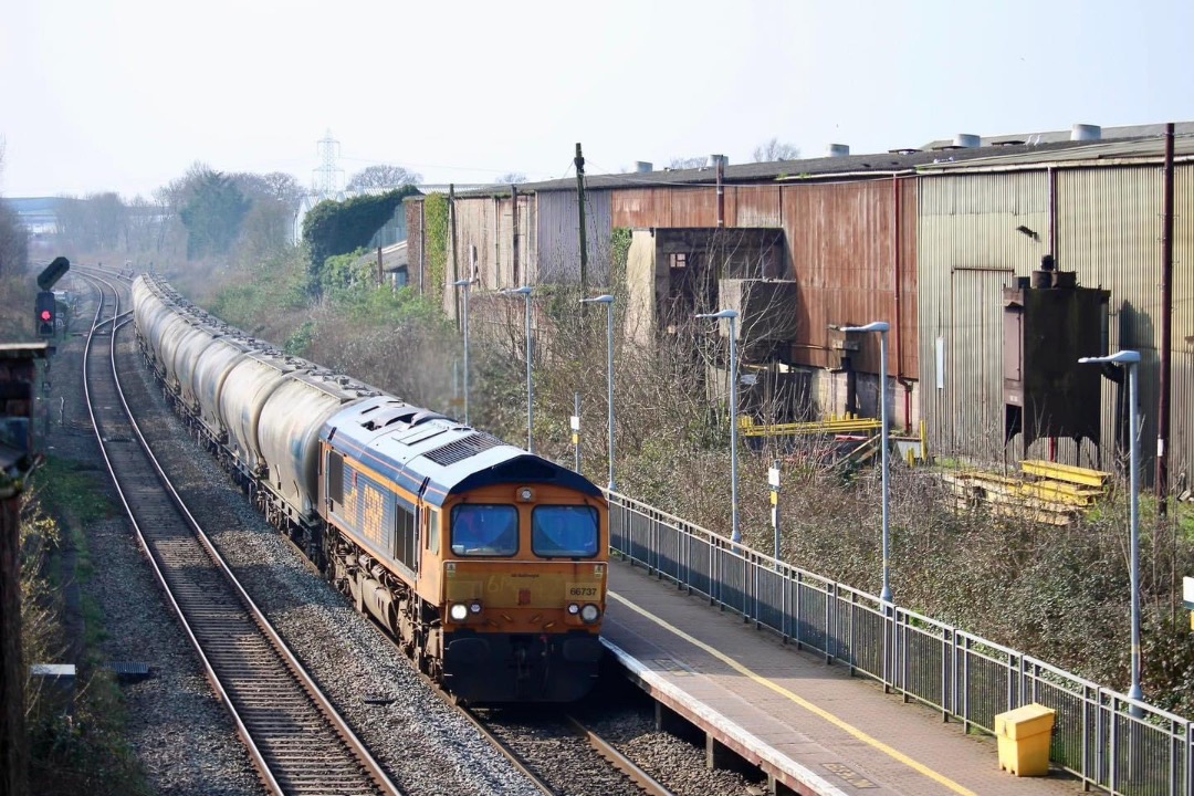 Inter City Railway Society on Train Siding: 66737 'LESIA' Seen passing Yate Rly Station with 6M42 Avonmouth to Penyffordd cement.