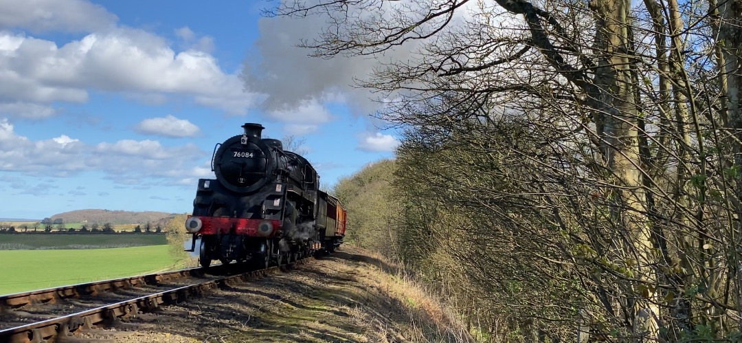 George on Train Siding: BR 4MT 76084 climbing up Kelling Bank at the North Norfolk Railway during their Spring Steam Gala 2022.