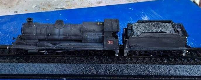 Geoff on Train Siding: Before and after shots of my conversion attempt from a GWR ROD loco to a Richmond Vale loco. Far from accurate I'd say, but good
enough for me