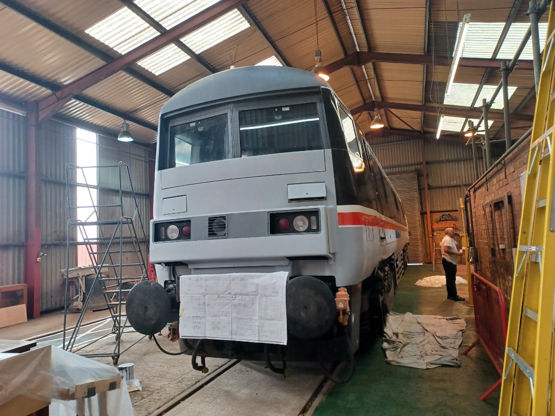 Trainnut on Train Siding: #photo #train #electric #depot #Crewehc 91020 at the Crewe Heritage Centre getting Intercity livery applied.
