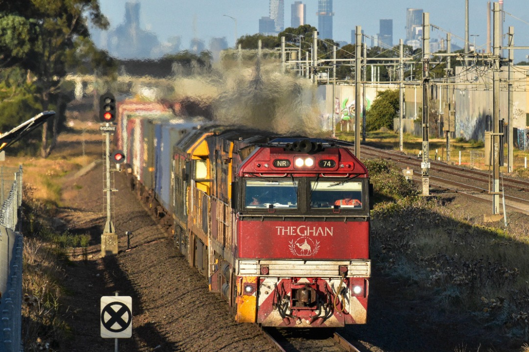Shawn Stutsel on Train Siding: On a chilly, sunny Autumn evening, Pacific National's NR74 (Ghan Livery) leads NR59 and G526 through Williams Landing,
Melbourne with...