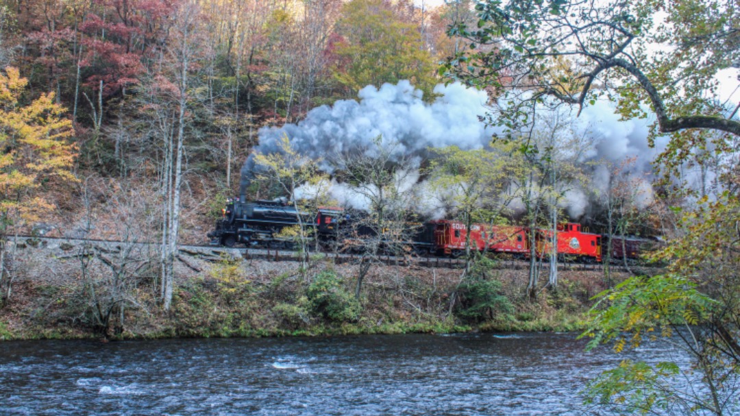 GreatSmokyMtnsRailfan on Train Siding: Great Smoky Mountains Railroad 1702 barks up into the Nantahala Gorge near Wesser, North Carolina.