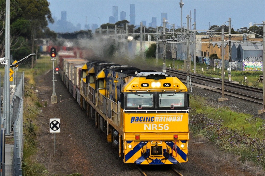 Shawn Stutsel on Train Siding: Pacific National's NR56, NR8, NR111, and NR117 races through Williams Landing, Melbourne with 7MP5, Intermodal Service bound
for Perth,...