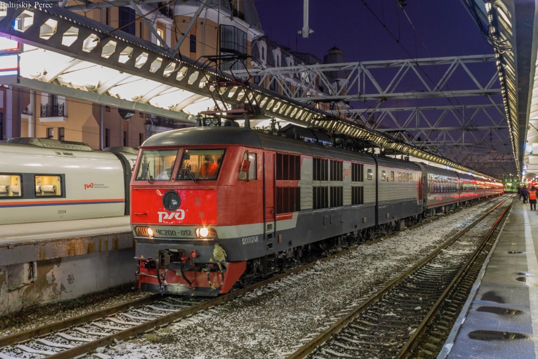 Vladislav on Train Siding: The CHS200-012 electric locomotive with the Nevsky Express high-speed train at the St. Petersburg-Glavny station. 2021