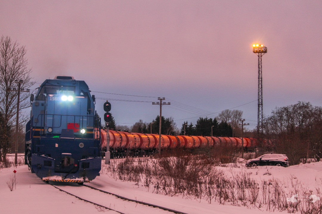 Adam L. on Train Siding: A former C30-7A, now an C30-M nicknamed "Otto" owned by Operail, is seen departing the Kohtla-Nõmme Interchange Yard
with a long string of...