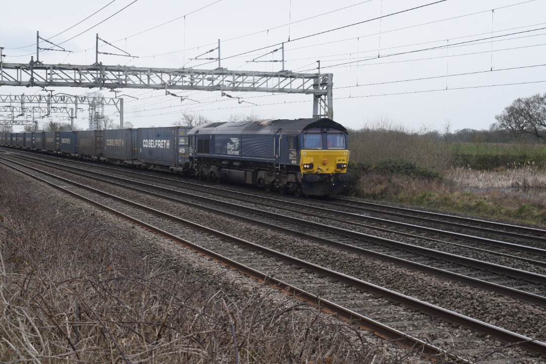 Hardley Distant on Train Siding: CURRENT: 66126 passes Chorlton just South of Crewe Basford Hall today with the 4S44 12:05 Daventry International Railfreight
Terminal...