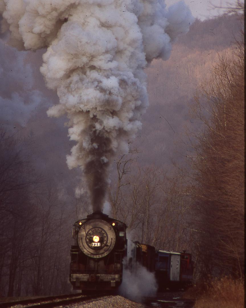 Tennessee Rail Productions on Train Siding: Seen here is former Lake Superior & Ishpeming #34 (Now WMSR #734) climbing one of Western Maryland Scenic's
many grades...