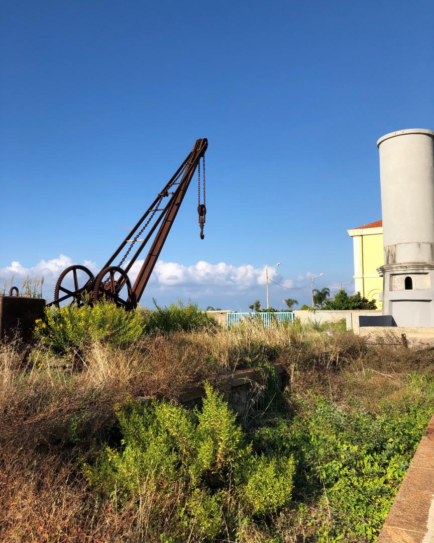 k unsworth on Train Siding: More abandoned infrastructure on the Lamezia Terme - Rosarno line , Pizzo Station, water tower, abandoned goods platform &
crane, there's...