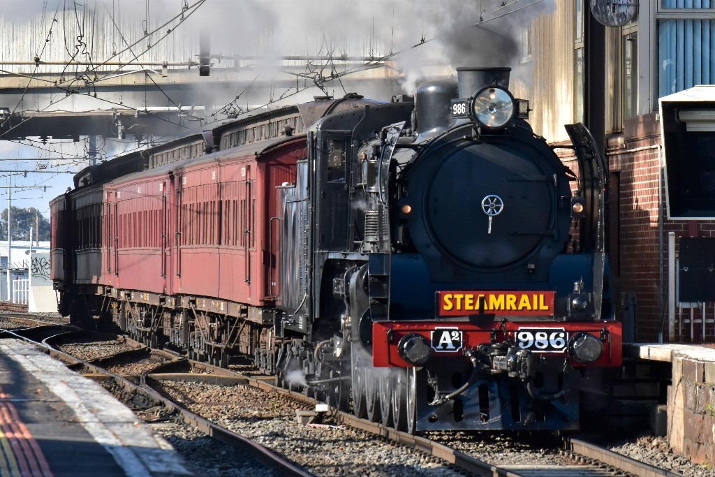 Shawn Stutsel on Train Siding: Steamrail's A2 986 along with K100 (K153) on the rear, steams into Newport Station, Melbourne with 8540, heading for
Lilydale to run...