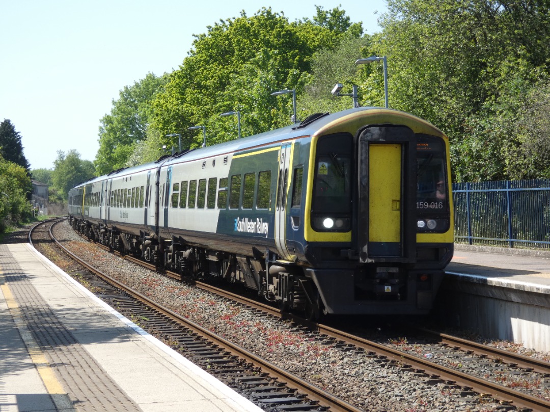 Jacobs Train Videos on Train Siding: #159016 is seen approaching Axminster station working a South Western Railway service to London Waterloo from Exeter St
Davids