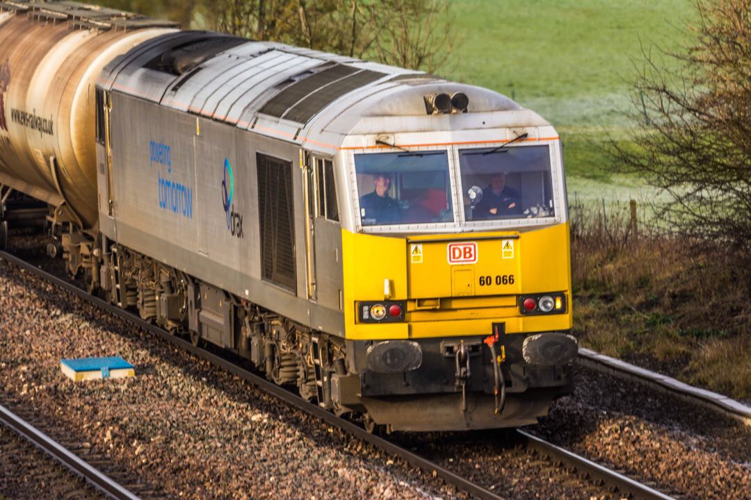 Wheels In Motion on Train Siding: Always love to see a Class 60, here we see 60066 wearing a Drax advertising scheme heading East towards Immingham.