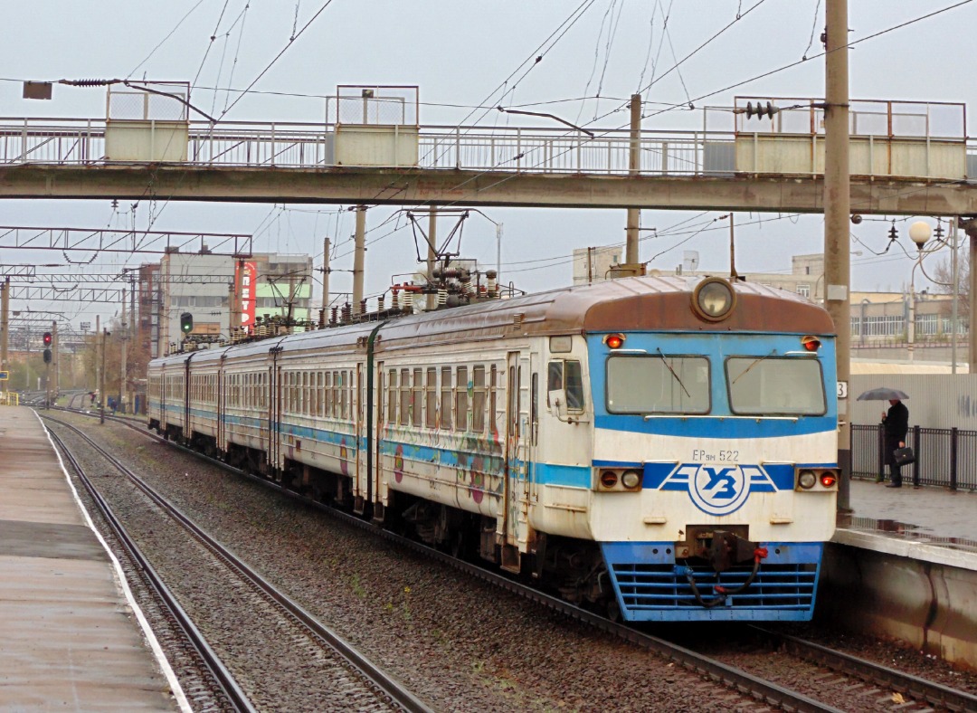 Yurko Slyusar on Train Siding: Сity electric train ER9M-522 at the Kyiv-Petrivka station (now renamed to Pochaina). Kyiv. This EMU-set was wrapped at the paint
scheme...