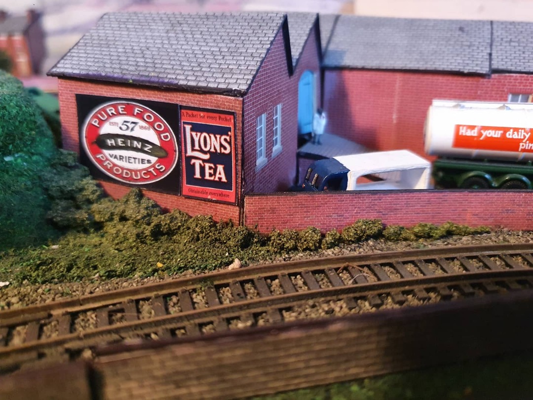 Locomotive Lloyd on Train Siding: Couple N gauge posters stuck up around the layout, adds that little bit of detail and life