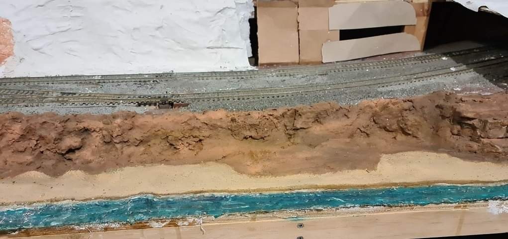 Geoff on Train Siding: My home internet is working again and found these pictures of some of the scenic work I'm building on our local club layout.
