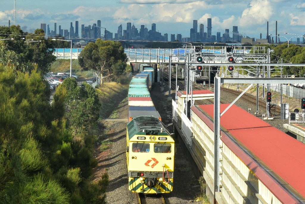 Shawn Stutsel on Train Siding: With a burst of sunshine, Aurizon's G535 races through Laverton, Melbourne, with the second half of 3MP1, Intermodal
Service.