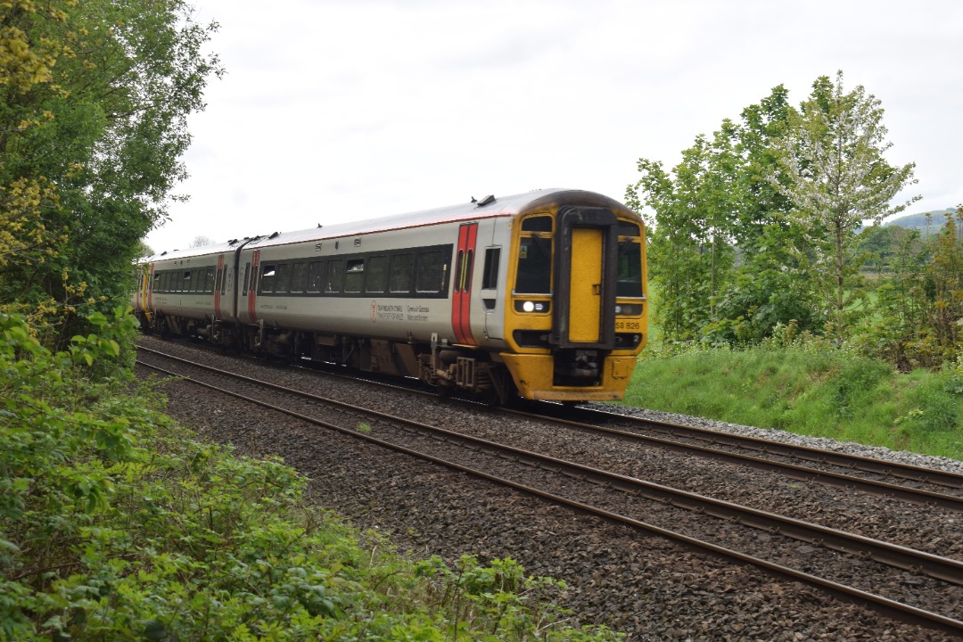 Hardley Distant on Train Siding: CURRENT: 158826 (Front - 1st Photo) and 158825 (Rear - 2nd Photo) pass Weston Rhyn Foot Crossing today with the 1D12 09:08
Birmingham...