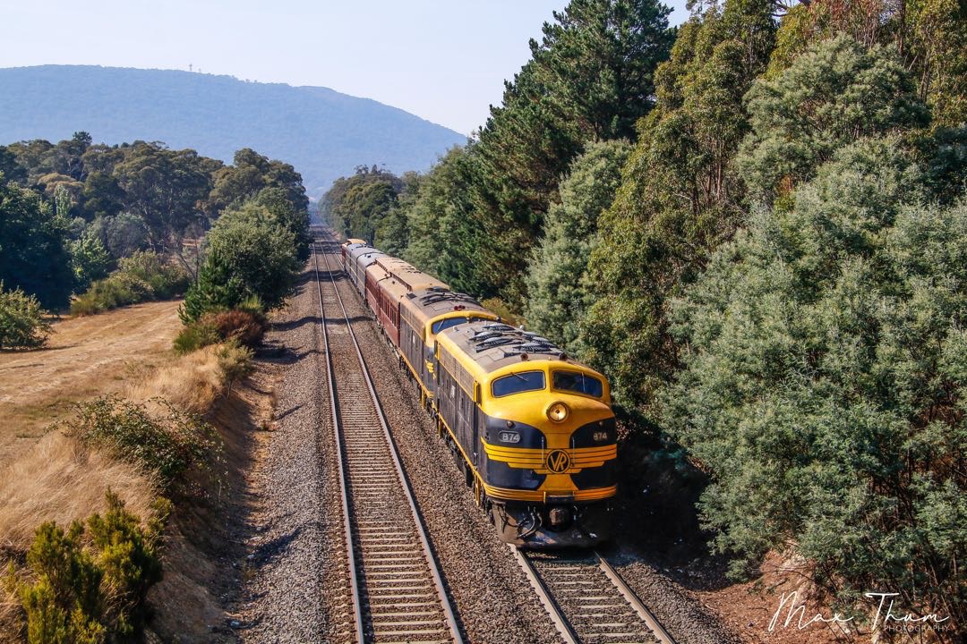 Max Thum on Train Siding: Powering towards the Goldfields. B74-S303 navigate through the ever so changing terrain of the Macedon Ranges.