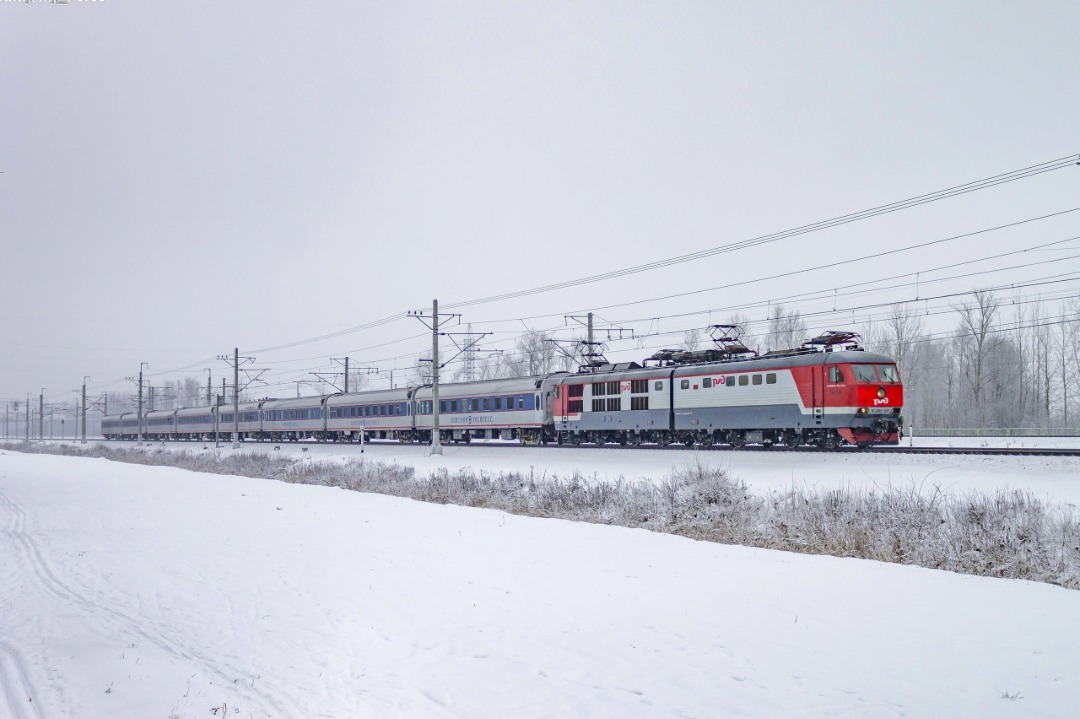 Vladislav on Train Siding: The CHS200-012 electric locomotive with the Nevsky Express high-speed train on the Kolpino - Sablino stage. 2021