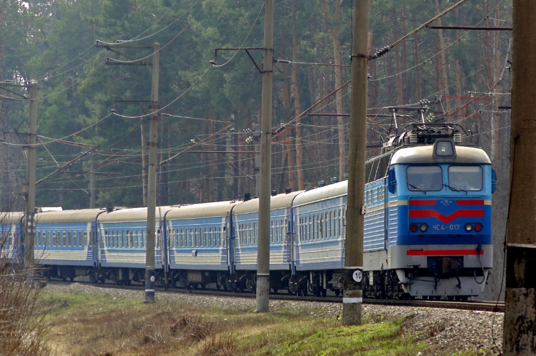 Yurko Slyusar on Train Siding: Electric locomotive ChS4-017 with a passenger train №179 "Ltava" Polatava - Kyiv at the Track post 7 km - Darnytsya
stretch. Passenger...