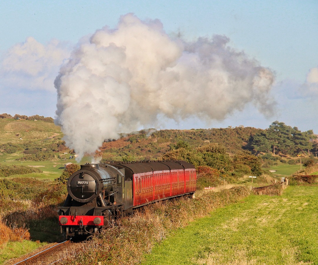 Ady on Train Siding: WD 2-10-0 90775 The Royal Norfolk Regiment steaming out of Sheringham heading for its next stop at Weybourne on the North Norfolk Railway
on The...