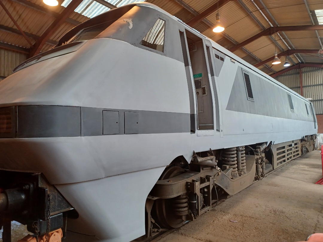 Trainnut on Train Siding: #photo #train #electric #depot #Crewehc 91020 at the Crewe Heritage Centre getting Intercity livery applied.
