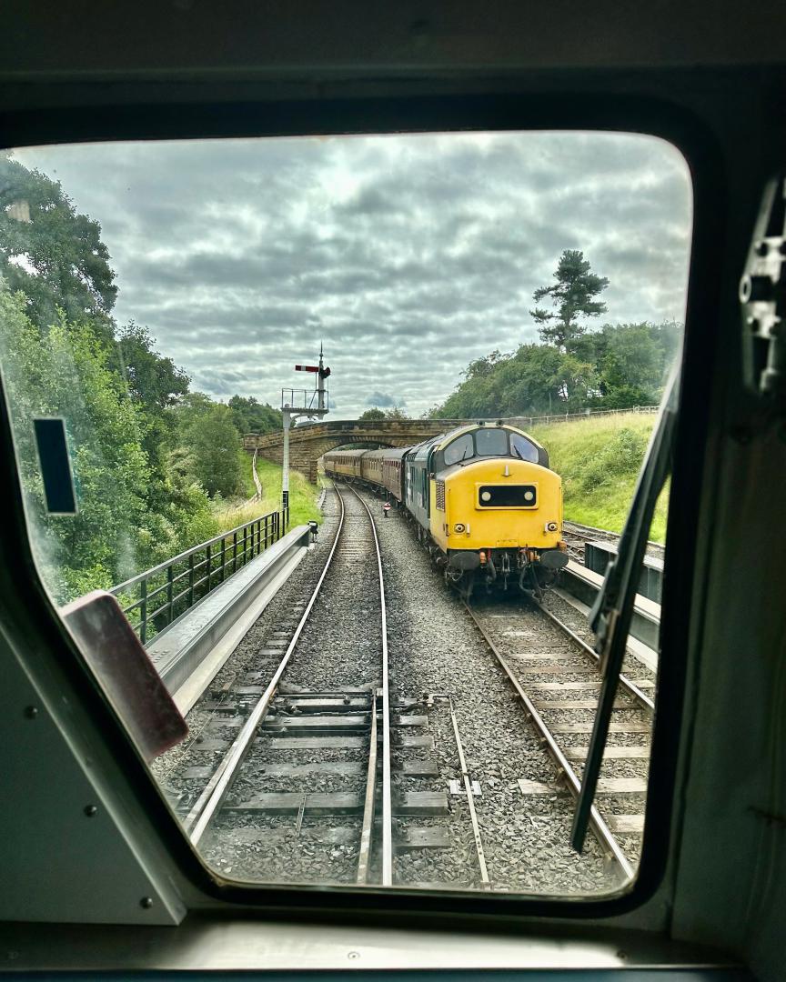 Michael Gates on Train Siding: Class 37, 37264 approaches Goathland station on the North. Yorkshire Moors Railway on the 10th August 2023. The picture is taken
from...