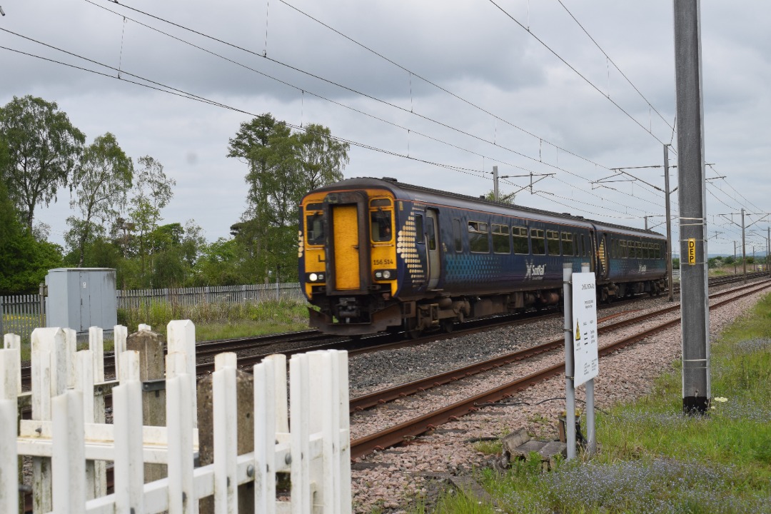 Hardley Distant on Train Siding: CURRENT: 156514 speeds over Floriston Level Crossing between Carlisle and Gretna Junction today working the 2L81 10:02 Dumfries
to...