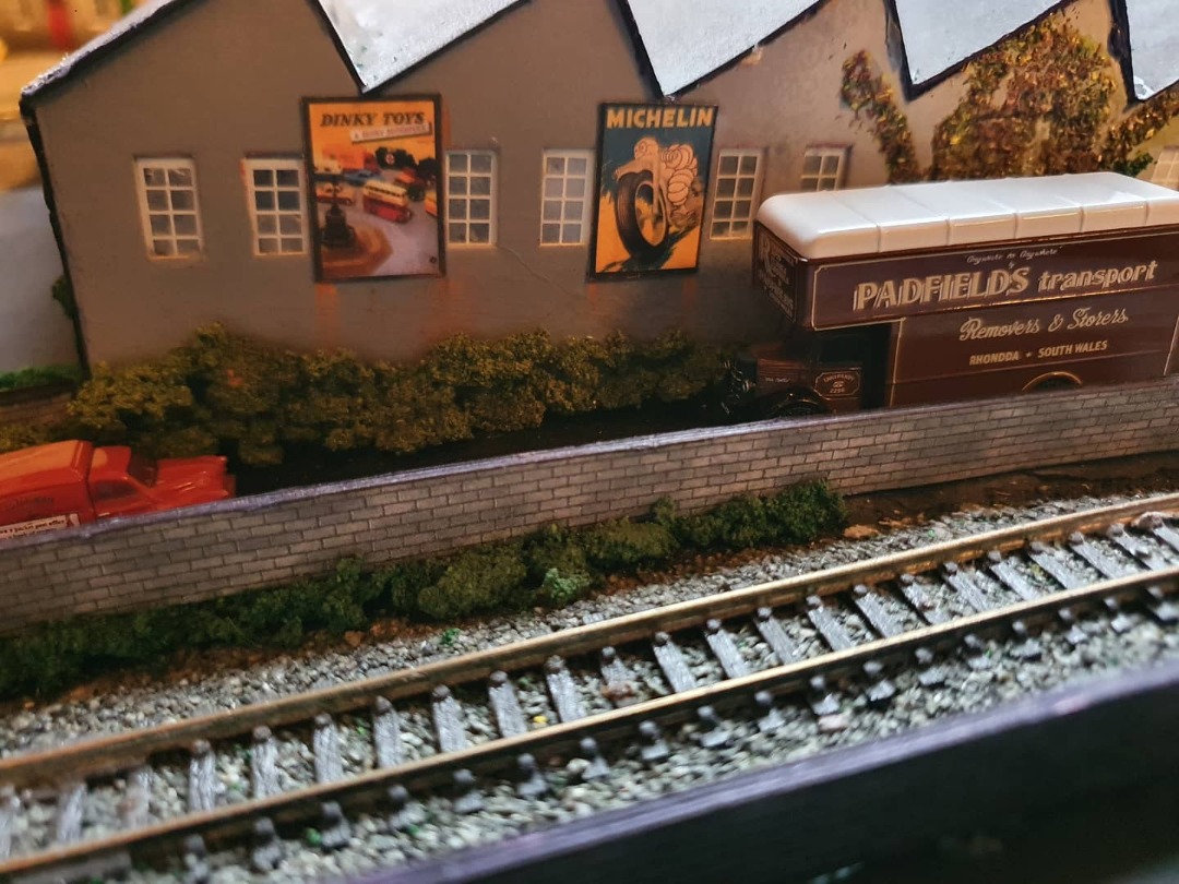 Locomotive Lloyd on Train Siding: Couple N gauge posters stuck up around the layout, adds that little bit of detail and life