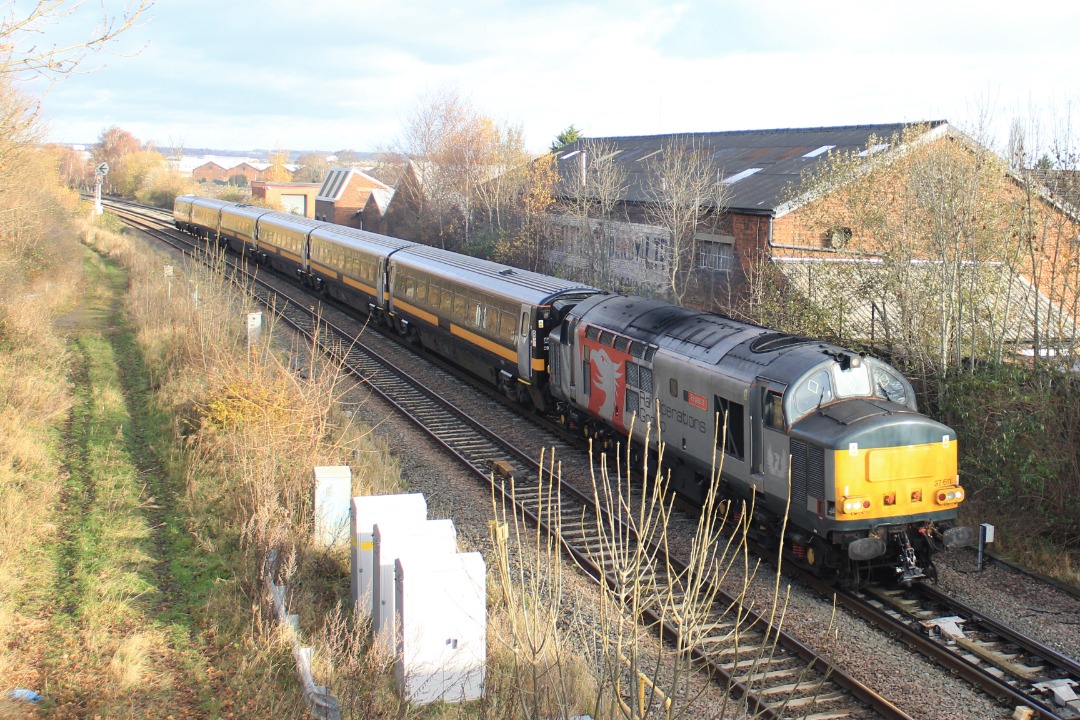 Jamie Armstrong on Train Siding: 37611 "Pegasus", 82227 and ex Grand Central Mk 4 stock Passing just north of Pear Tree Railway Station working 5Q86
Doncaster works to...
