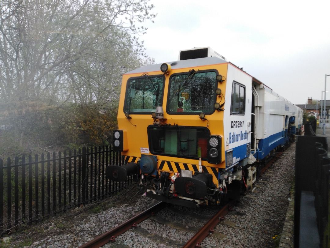WBM on Train Siding: Track tamper DR73917 sitting at what was once platform 1 at Robertsbridge and is now the access sidings for network rail to get to the
rother...